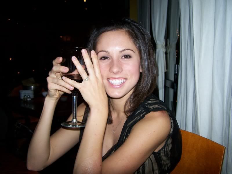 nik showing off her ring