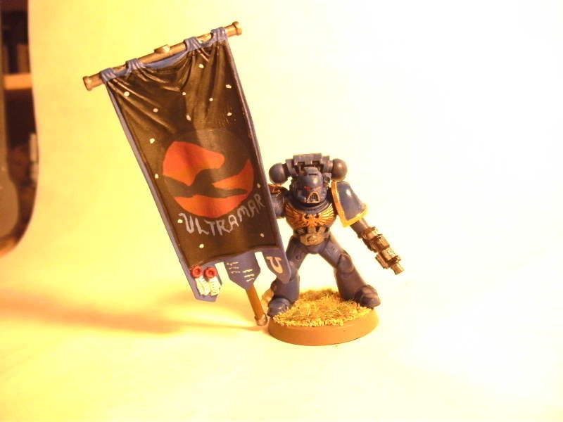 http://i55.photobucket.com/albums/g157/gregadama/warhammer/standardbearer.jpg?t=1262650485